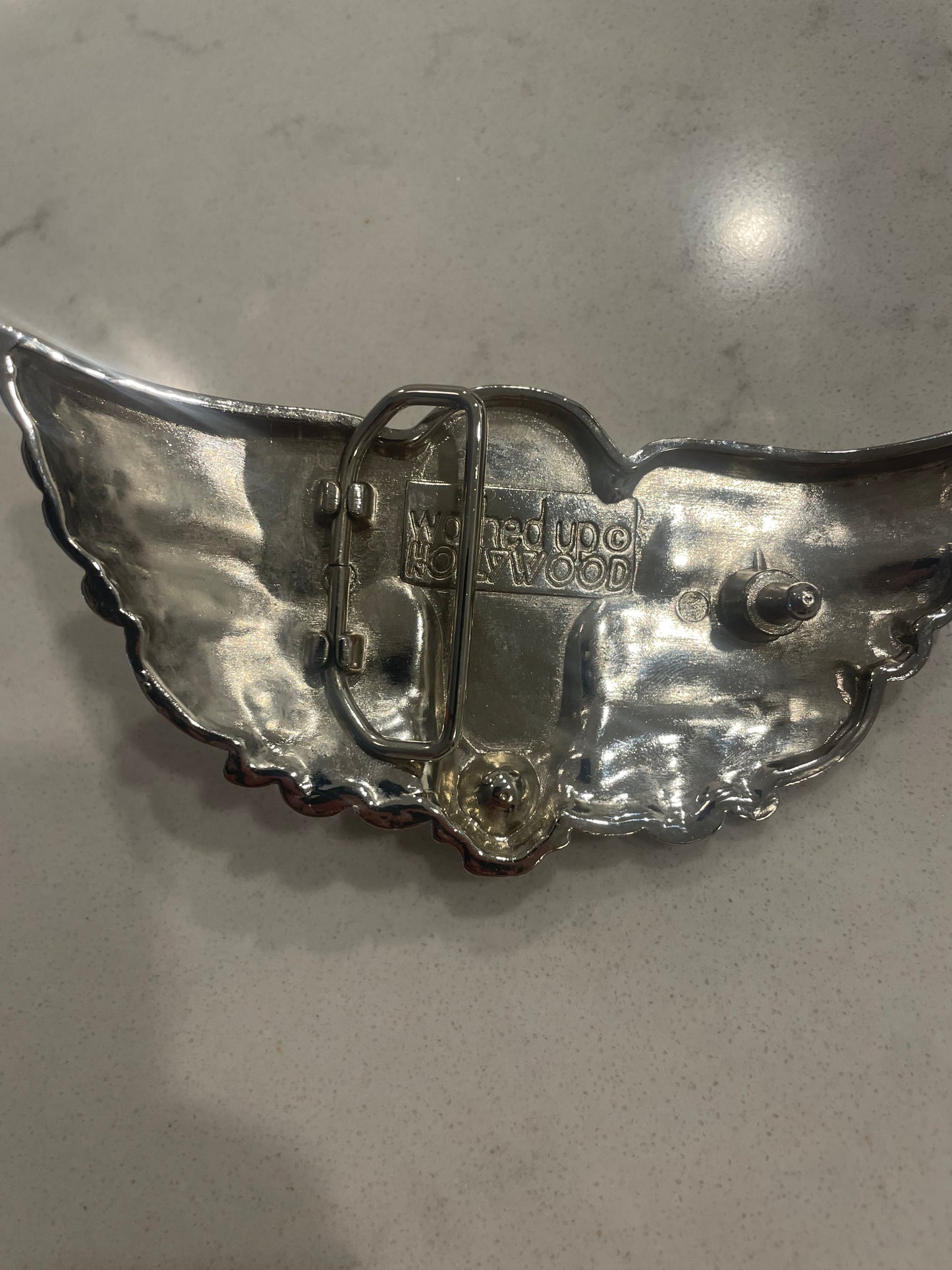 Washed up Hollywood belt buckle